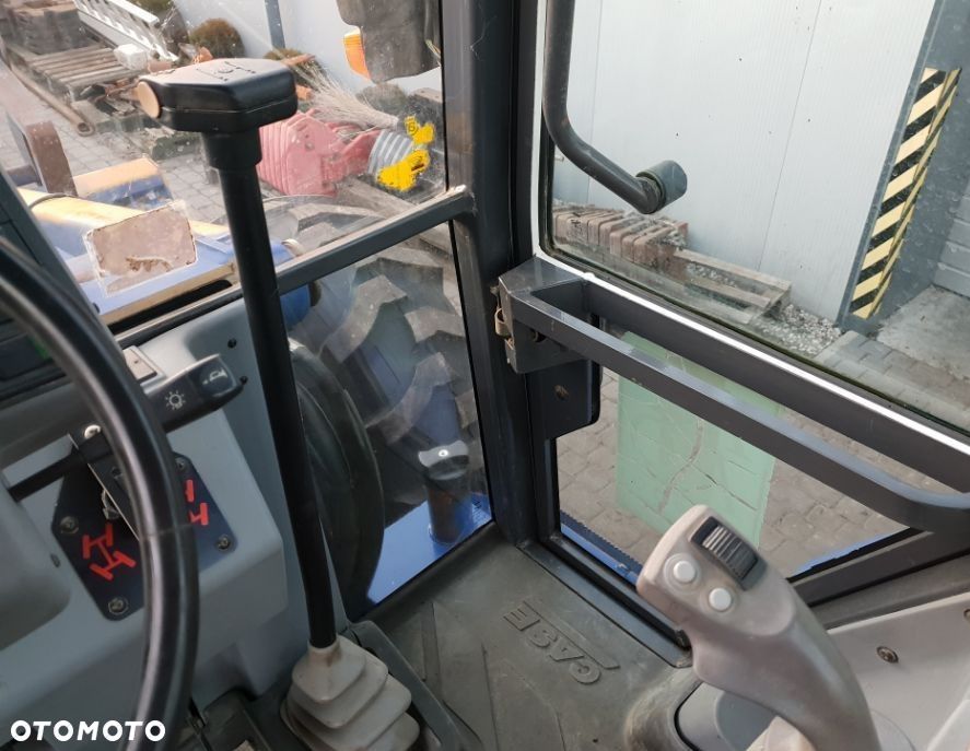 Case 595 Super LE ładowarka kołowa - 15