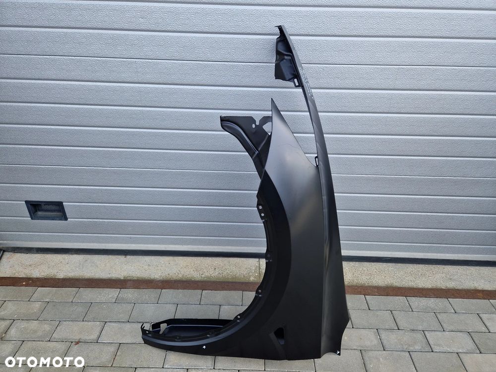 BŁOTNIK PRZEDNI LEWY TESLA MODEL Y (5YJY) 2019-- NOWY STALOWY - 1
