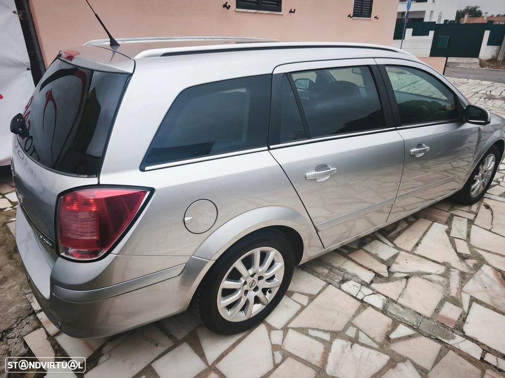 Opel Astra Caravan 1.9 CDTi Cosmo - 27