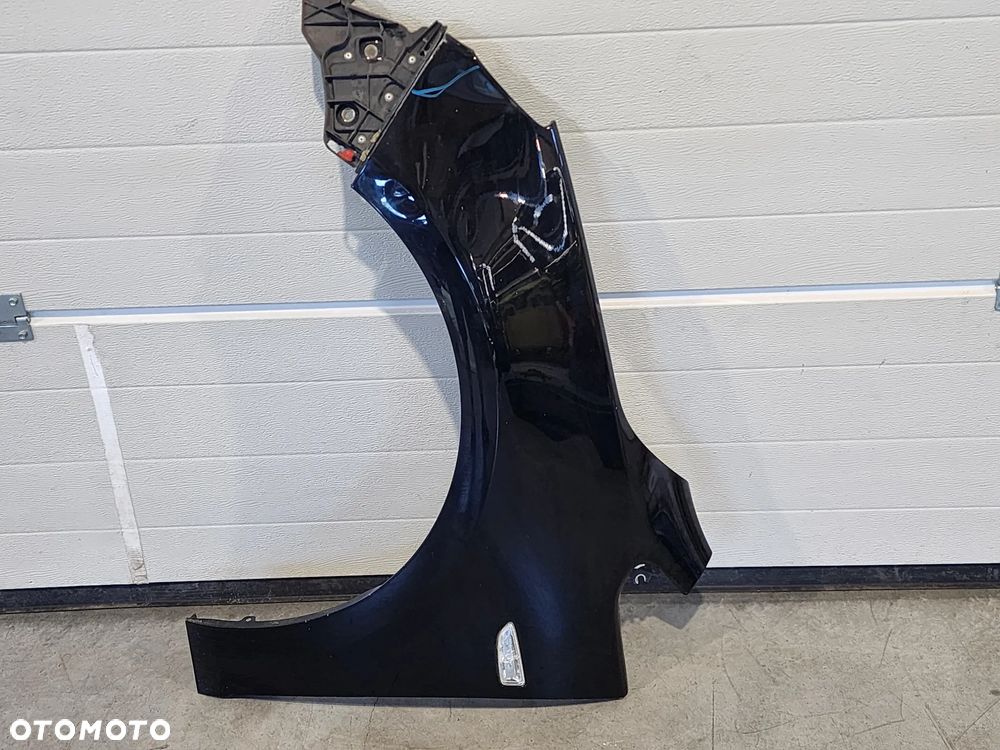 Opel ASTRA J błotnik lewy Z20R - 1