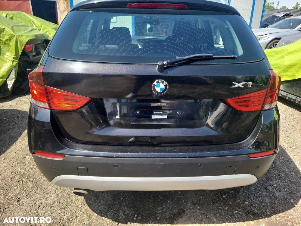 Haion+luneta pe negru bmw x1 e84 - 1