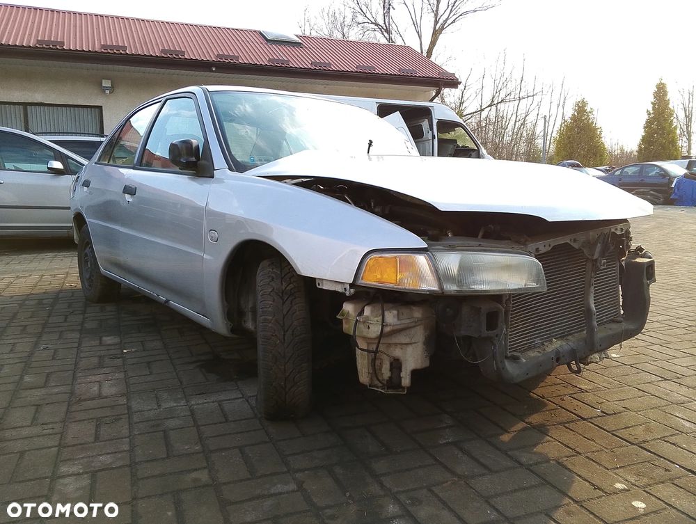 Mitsubishi Mirage CK2A Po Lift (99-03r.) 1.5 B 110KM. Silnik 4G15 Skrzynia F5M41 lakier A69 / A69A. Cały na części. GWARANCJA !!! Przód Tył Zestaw Komplet Drzwi Klapa Zderzak Błotnik Maska Grill Atrapa Szyba Pas Lampa Lusterko Boczki Fotel Kanapa Kokpit Deska Rozdzielcza Przełącznik Włącznik Sterownik Przewody Wiązka Instalacja Moduł Komputer Czujnik Listwa Pompa Alternator Wtryski Głowica Rozrusznik Kompresor Sprzęgło Dwumas Silnik Skrzynia ABS Klimatyzacji Paliwa Wspomagania Kolektor Turbina Przepustnica Zawór Chłodnica Koło Hak Belka Sanki Zawieszenie Mcpherson Półoś Amortyzator Wydech Tłumik Zacisk Most - 7
