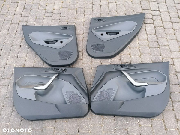 FORD FIESTA MK7 BOCZKI TAPICERKI DRZWI EUROPA KPL
