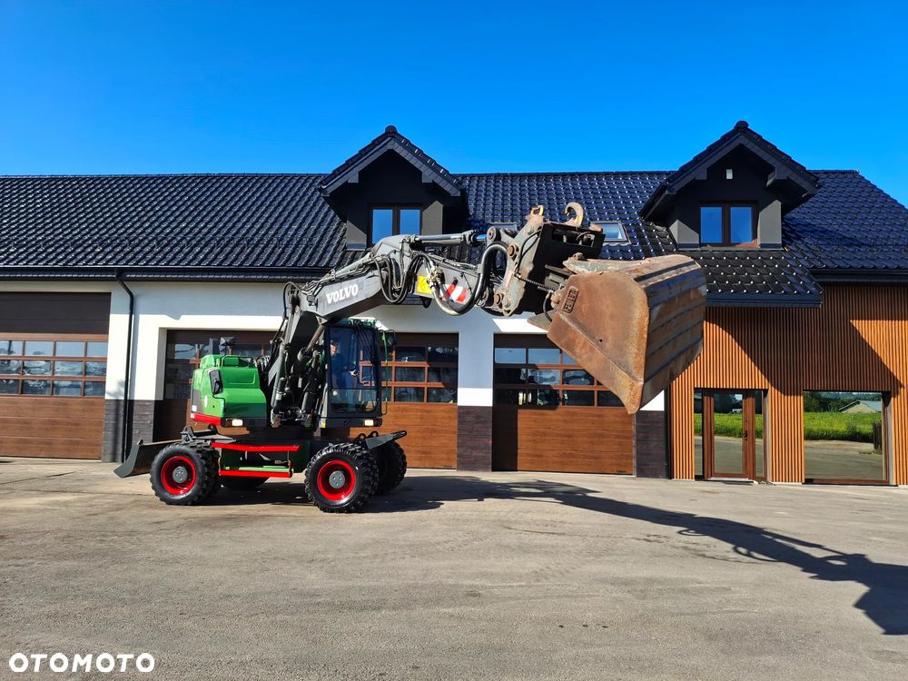 Volvo EW 140D Koparka Kołowa OilQuick Szybkozłącze Podwójne Koła 2015 Rok 2439 MTH Moc: 204 KM Dodatkowa Łyżka Pług Bardzo Dobry Stan Sprowadzona - 15
