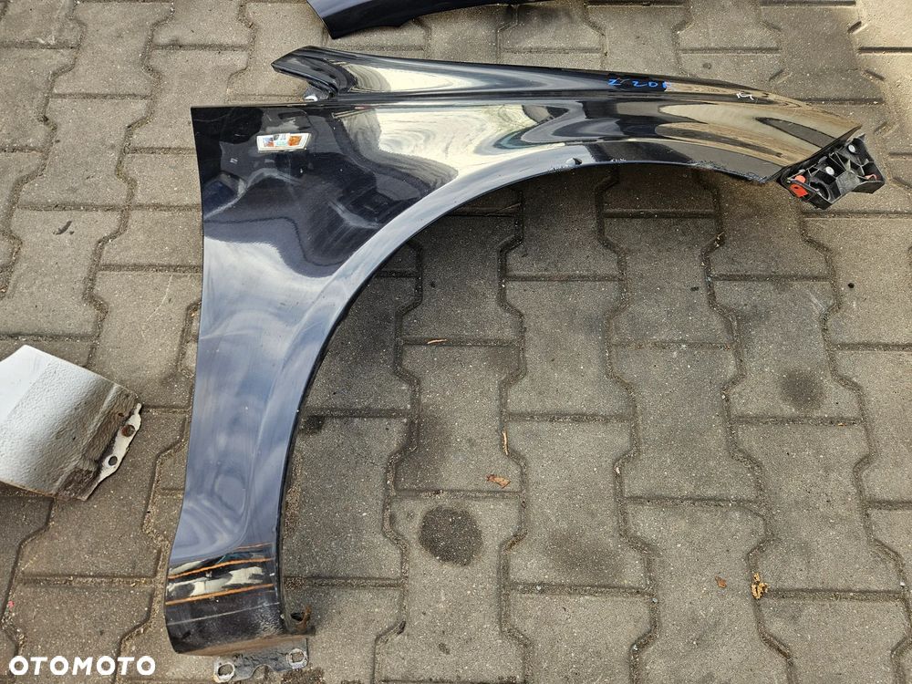 Opel Corsa D Błotnik przód przedni prawy  Z20R - 1