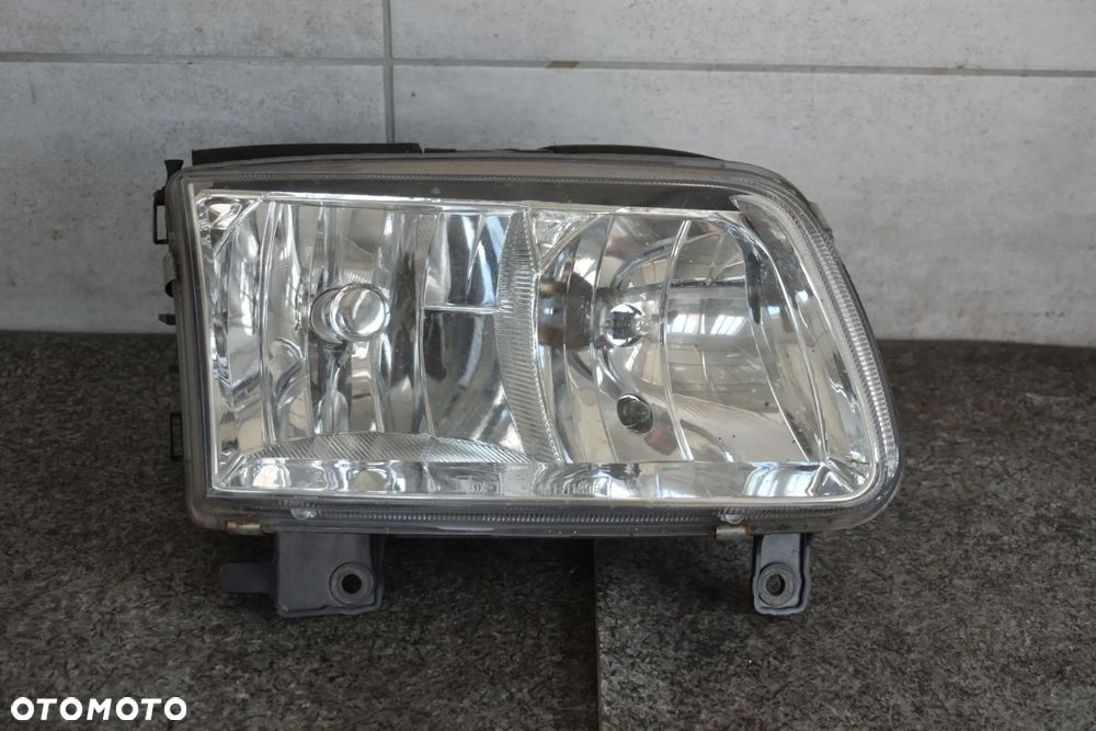 LAMPA PRZÓD PRAWA POLO 6N2 99-01r. - 1