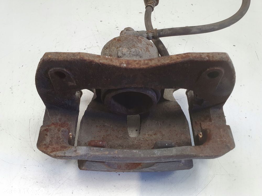 Toyota Rav4 III PRZEDNI ZACISK HAMULCOWY prawy przód kierowcy advics 63-28 - 14