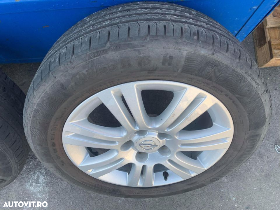 Set de jante cu cauciuc pentru Opel Astra H/Zafira B, 205/55R 16H, cod 0P026K7 - 5