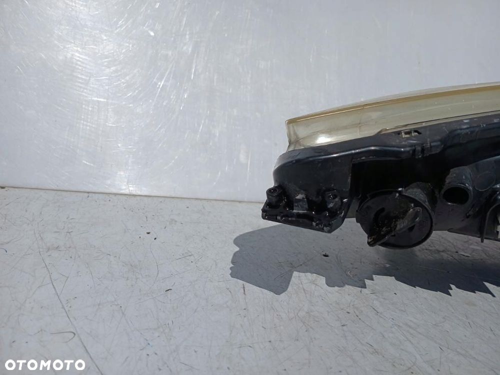 REFLEKTOR PRZÓD PRZEDNI LEWY LAMPA RENAULT SCENIC III 3 89902928 - 3