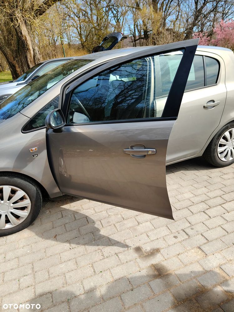 Opel Corsa 1.2 16V Enjoy - 11