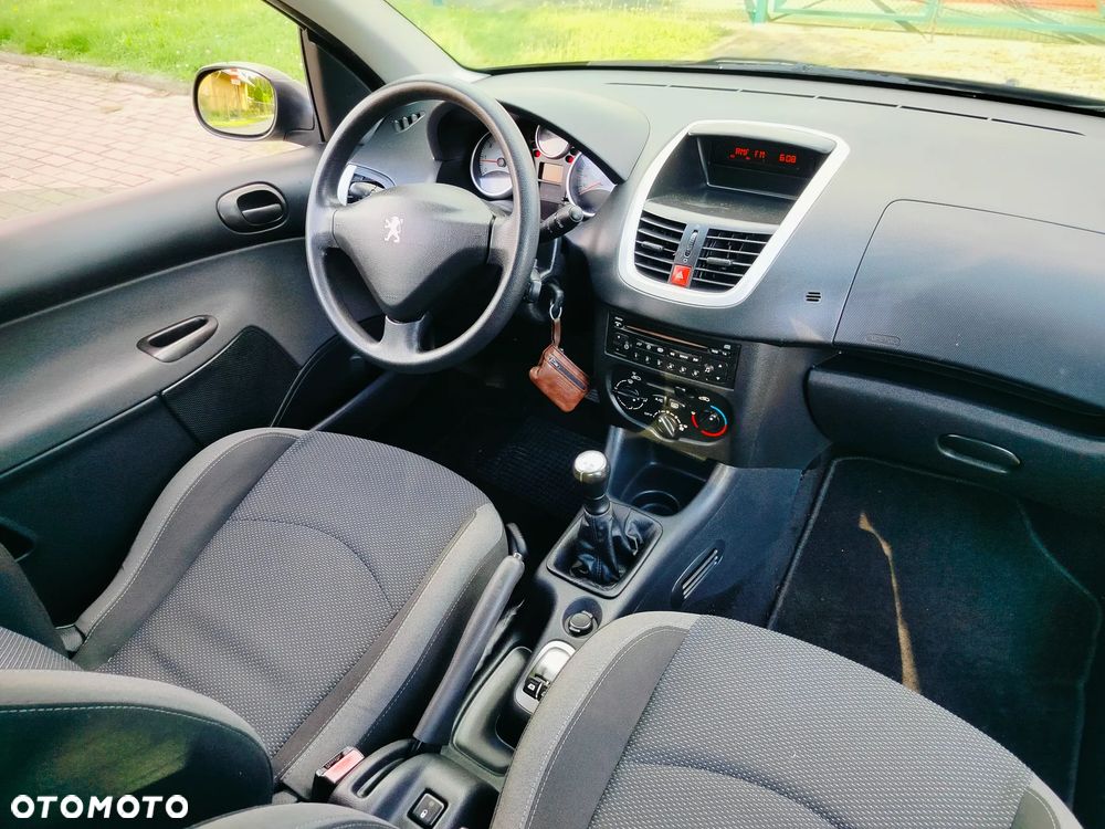 Peugeot 206 plus 75 - 12