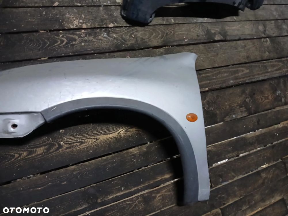 Opel Corsa B Błotnik lewy - 2