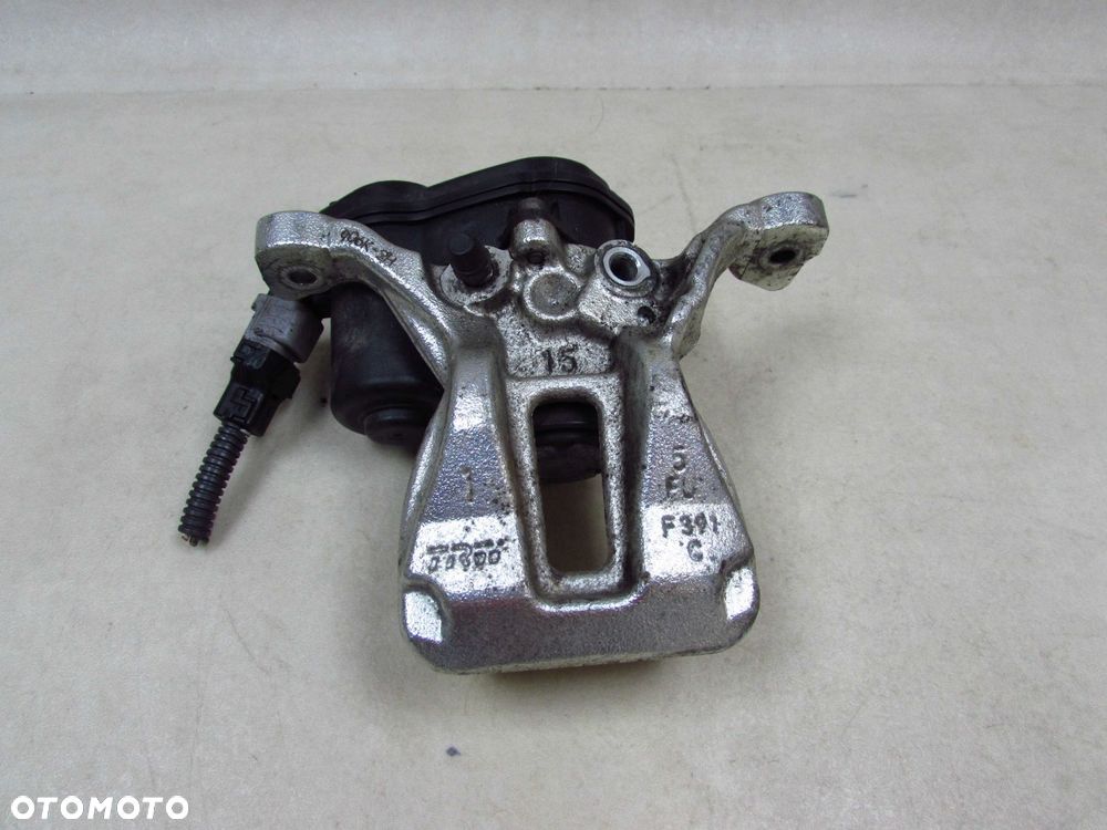 TOYOTA COROLLA E21 C-HR 19-23 ZACISK HAMULCOWY LEWY TYL ELEKTRYCZNY - 1
