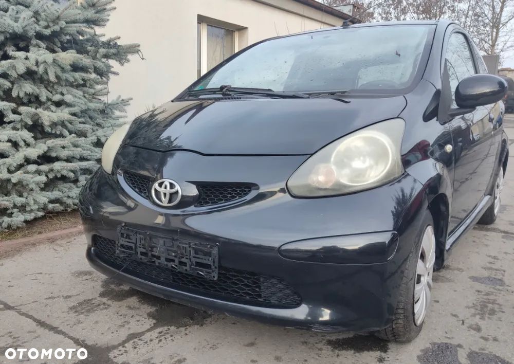 TOYOTA AYGO I MASKA ZDERZAK LAMPY PAS PRZEDNI KOMPLET EU LAKIER 211