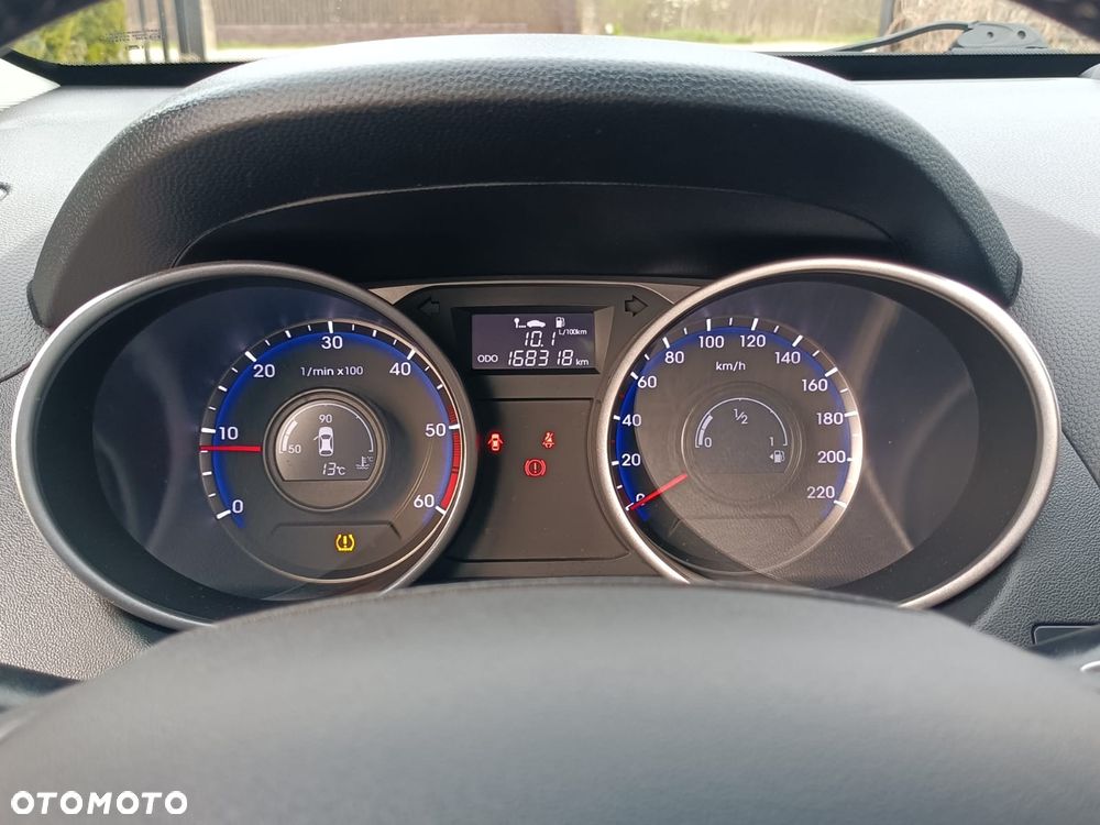 Hyundai ix35 1.7 CRDi 2WD blue Finale Gold - 34