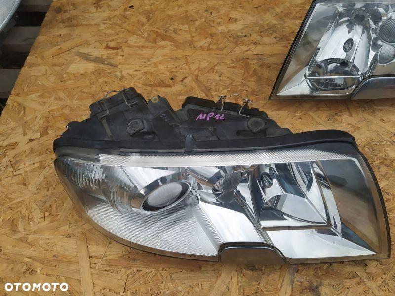REFLEKTOR LAMPA PRAWA + LEWA EUROPA KSENON SKODA SUPERB I 1 - 5