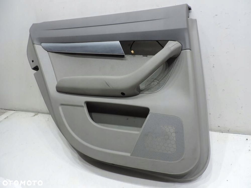 TAPICERKA DRZWI LEWY TYŁ AUDI A6 C6 - 2