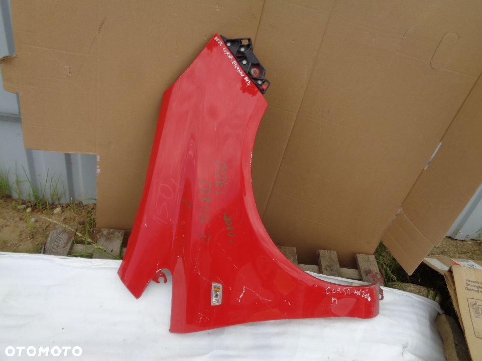 OPEL CORSA D BŁOTNIK PRAWY PRZÓD - 1