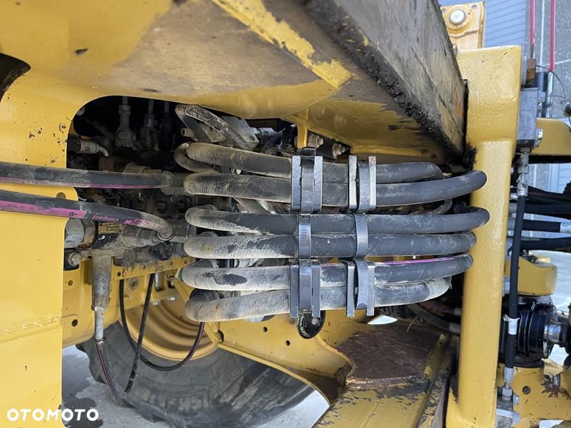 Caterpillar 428 F , rok 2012 4 łyżki, widły. - 11