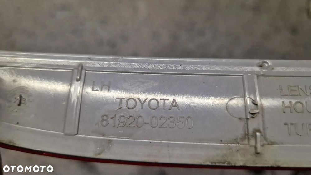 TOYOTA COROLLA E 21 SEDAN ODBLASK ZDERZAKA LEWY TYŁ 81920-02350 - 3