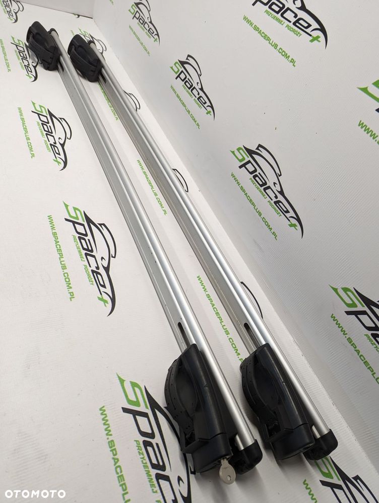 Bagażnik dachowy bazowy na otwarte relingi Thule 775 aerobar 120cm z napisem Renault. - 7