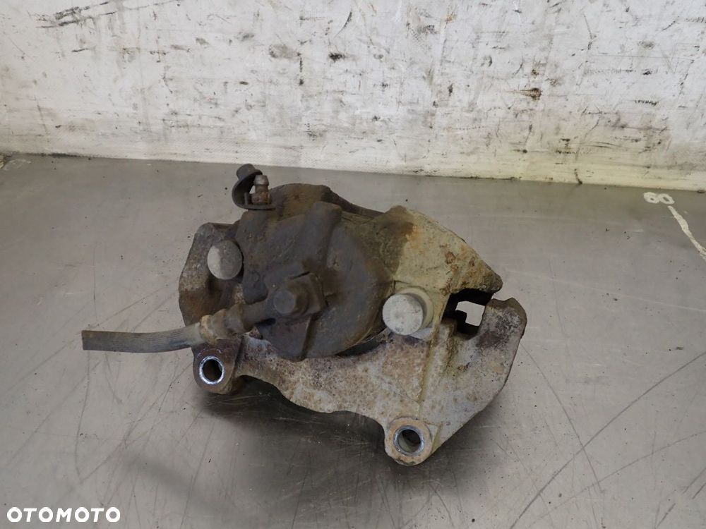 ZACISK HAMULCA LEWY PRZÓD OPEL ZAFIRA B 1.9 - 4