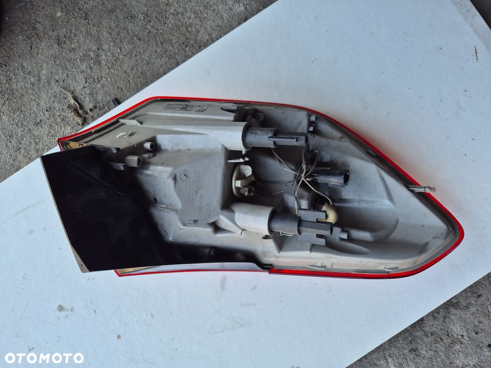 TYLNA LAMPA LEWA OPEL ASTRA J LIFT KOMBI - 2