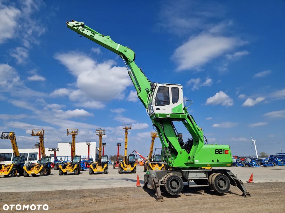 Sennebogen 821E jak FUCHS CAT M500 - 6