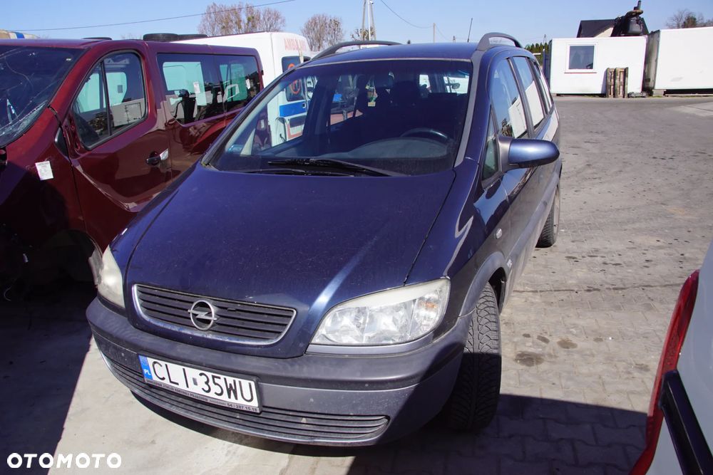 Auto na części - Opel Zafira A 1.8 16V 125 KM Z18XE F17 36U 2002R Silnik Skrzynia Drzwi Maska Zderzak Błotnik Klapa Klamka Lampa Lusterko Szyba Deska Kokpit Sterownik Moduł Czujnik Licznik Wyświetlacz Panel Kierownica - 1
