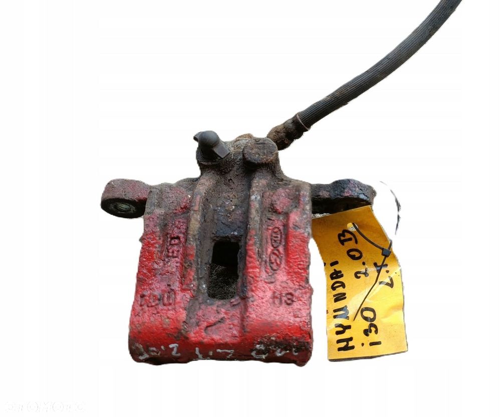 HYUNDAI i30 I 2,0 B 07-12 r. ZACISK HAMULCOWY LEWY TYŁ + - 1