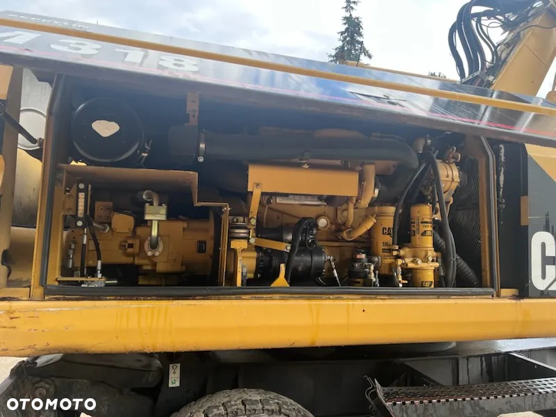 Caterpillar M318 - 11