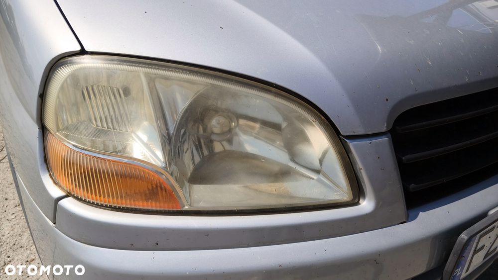 SUZUKI IGNIS I 02r LAMPA PRAWY PRZÓD PRZEDNIA EUROPA - 1