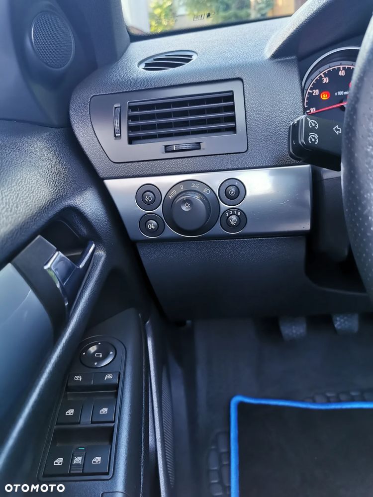Opel Astra 1.8 Cosmo - 11