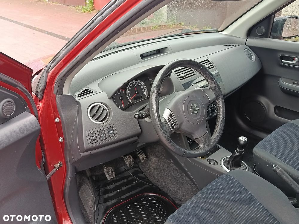 Suzuki Swift 1.3 Club - 8