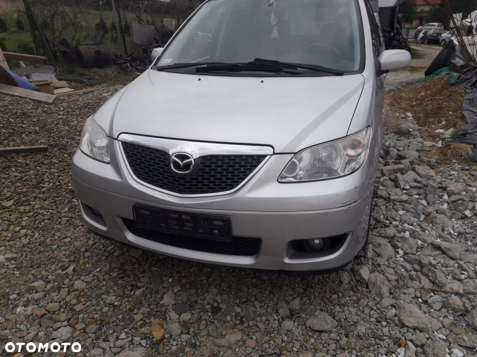 Mazda MPV 04-06 Maska lampa zderzak pas atrapa 22V - 8