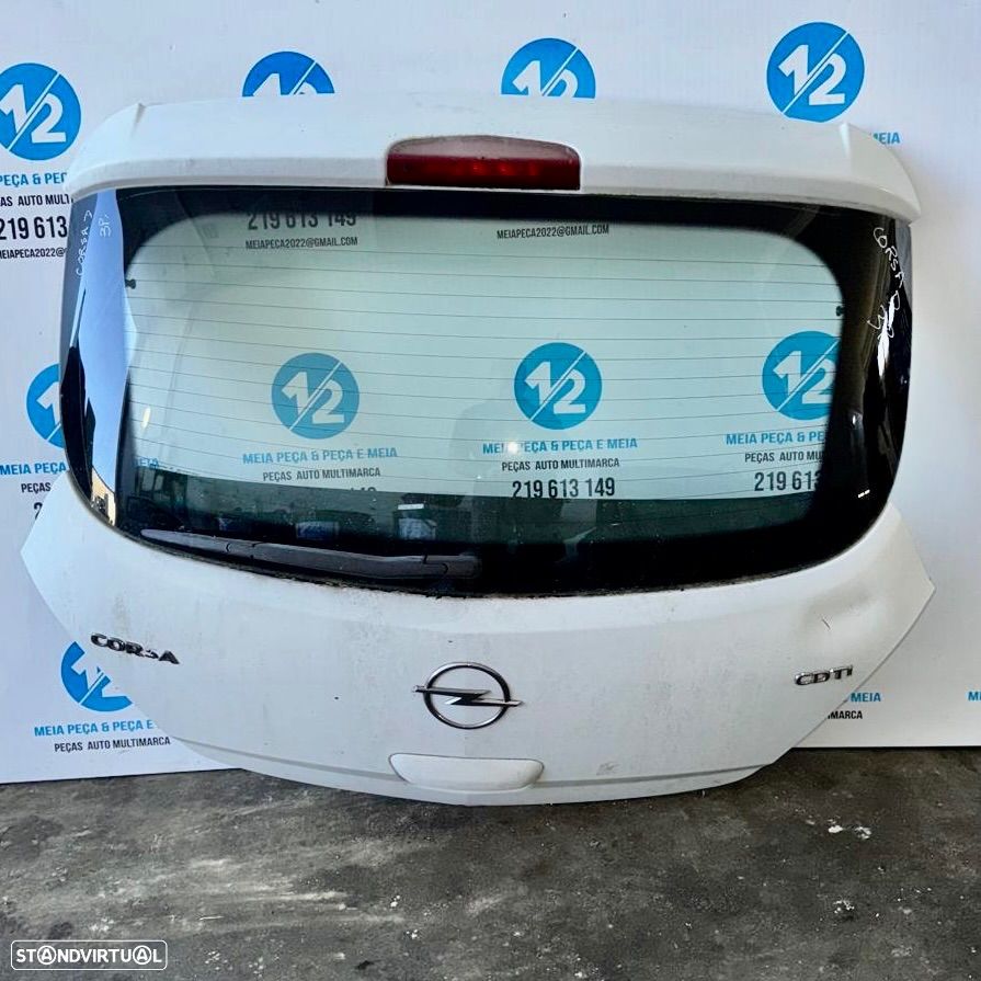 Tampa da Mala Opel Corsa D - 1