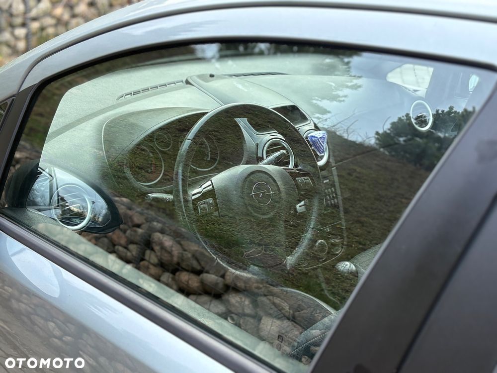 Opel Corsa 1.2 16V Enjoy - 23