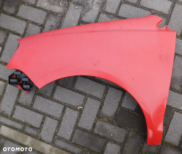 błotnik lewy przód VW POLO 9N 9N2 LIFT 05-08 czerwony