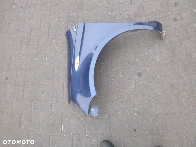 BŁOTNIK LEWY PRZÓD LEWY PRZEDNI TOYOTA YARIS I LIFT 03-05 - 11