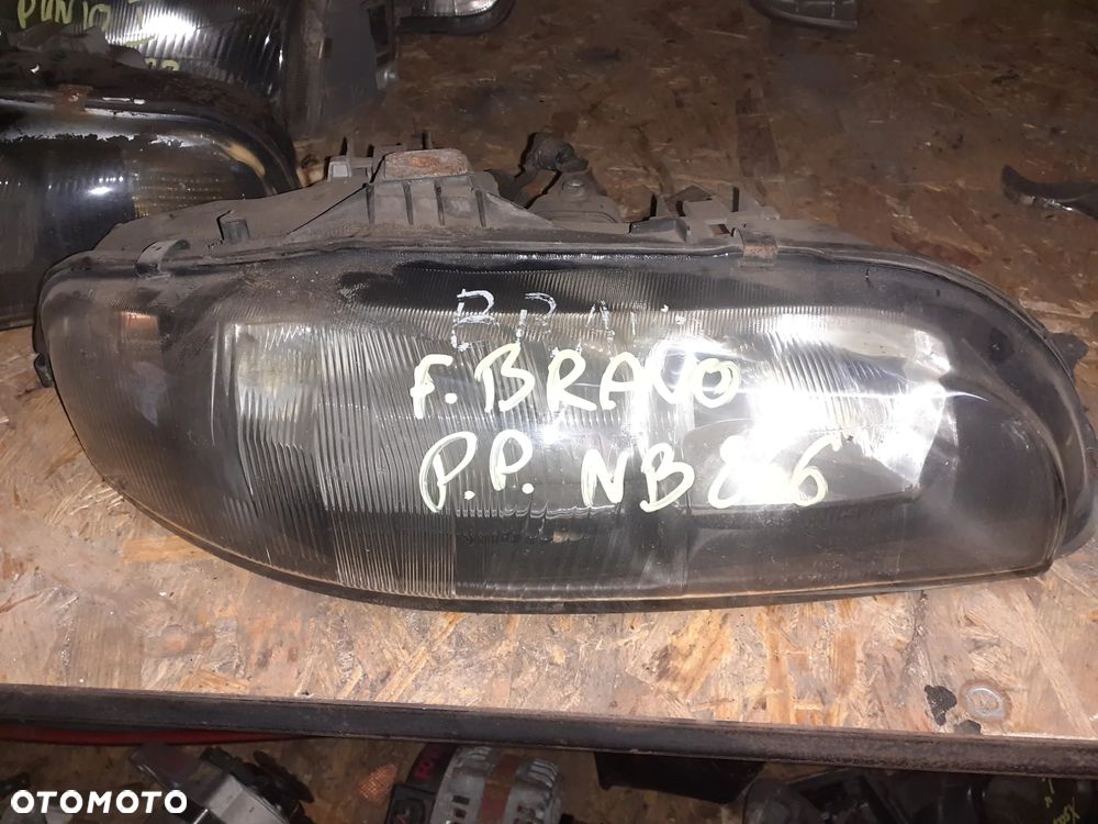 Reflektor PRAWY PRAWA LAMPA PRZÓD FIAT BRAVO BRAVA MAREA