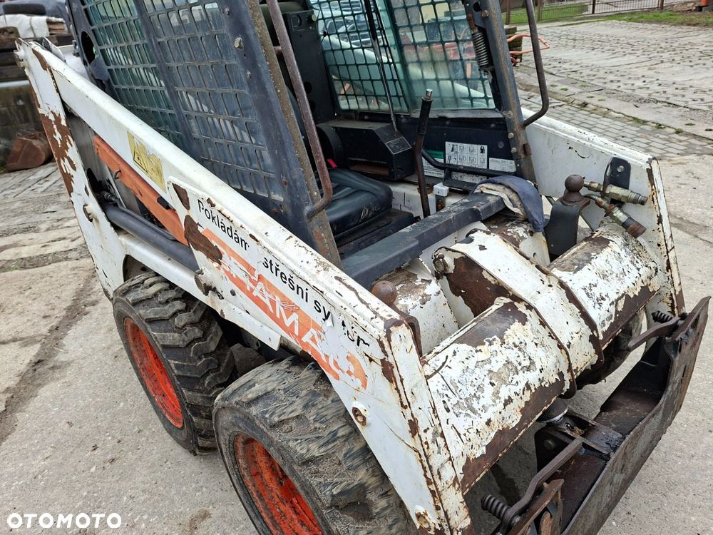 Bobcat 553 4X4 + Melroe Ingersoll-Rand 725S B/H - 22