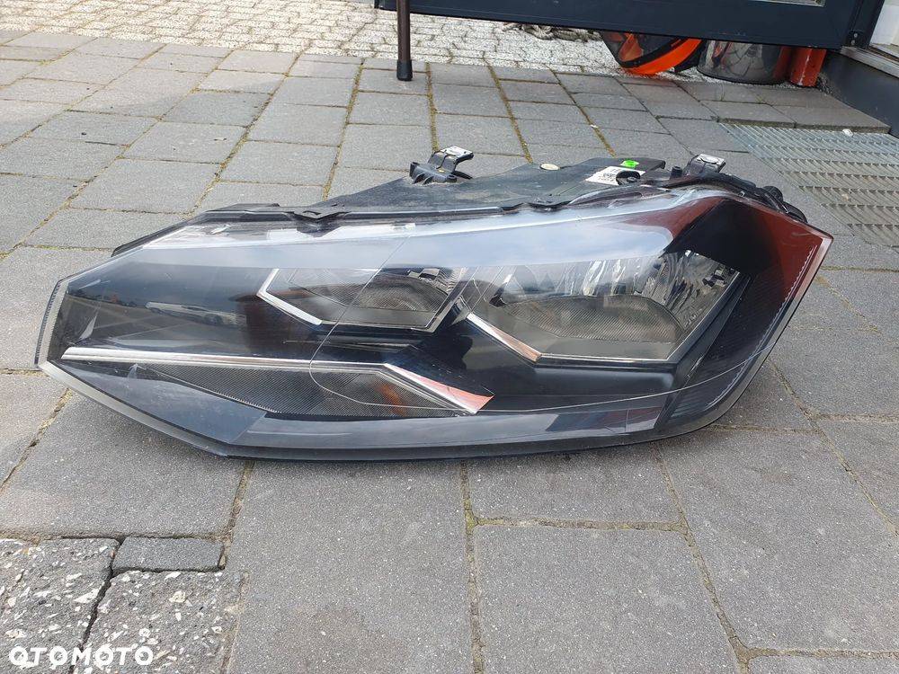 DEPO REFLEKTOR LAMPA LEWY VOLKSWAGEN POLO 2G1 941 005 - 1