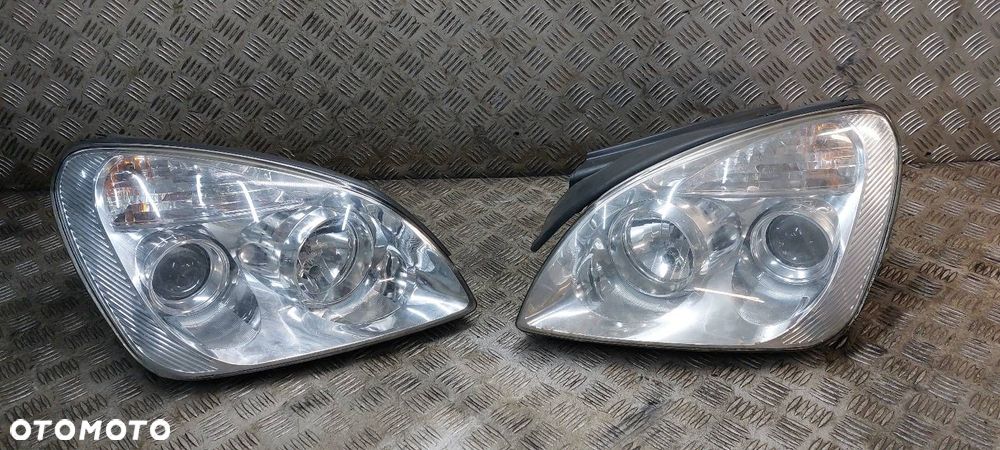 LAMPA LEWY PRZÓD + PRAWY PRZÓD CARENS III EUROPA - 1