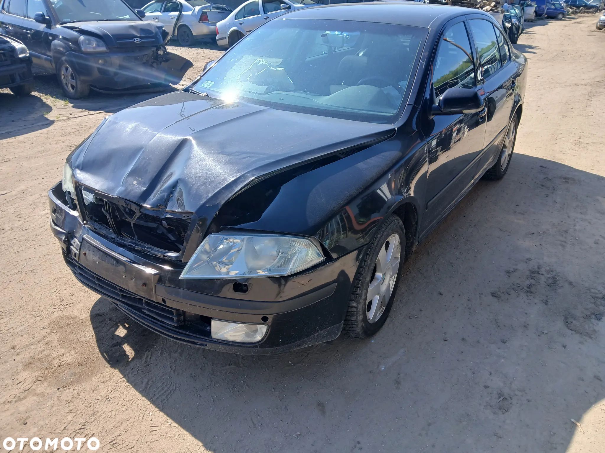skoda octavia II fotel fotele kanapa deska kokpit podsufitka boczek boczki klamka podłokietnik licznik - 1