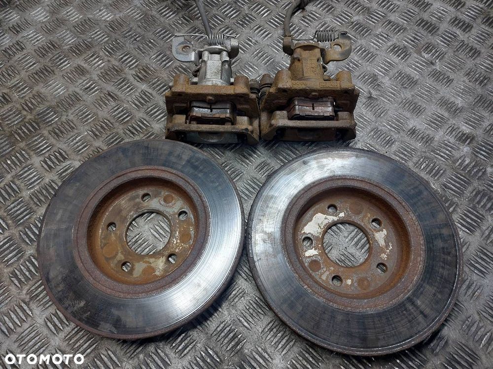 TARCZE HAMULCOWE TYŁ + KLOCKI + ZACISKI FORD MONDEO MK3 - 2