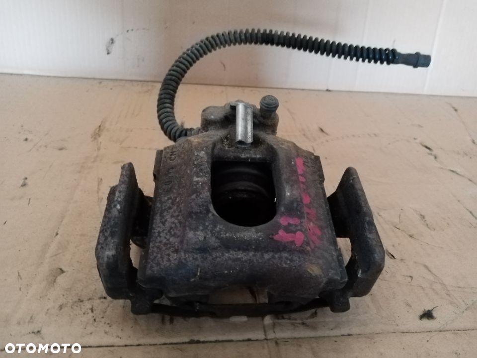 Zacisk hamulcowy lewy tył tylny VW Touareg 7L - 1