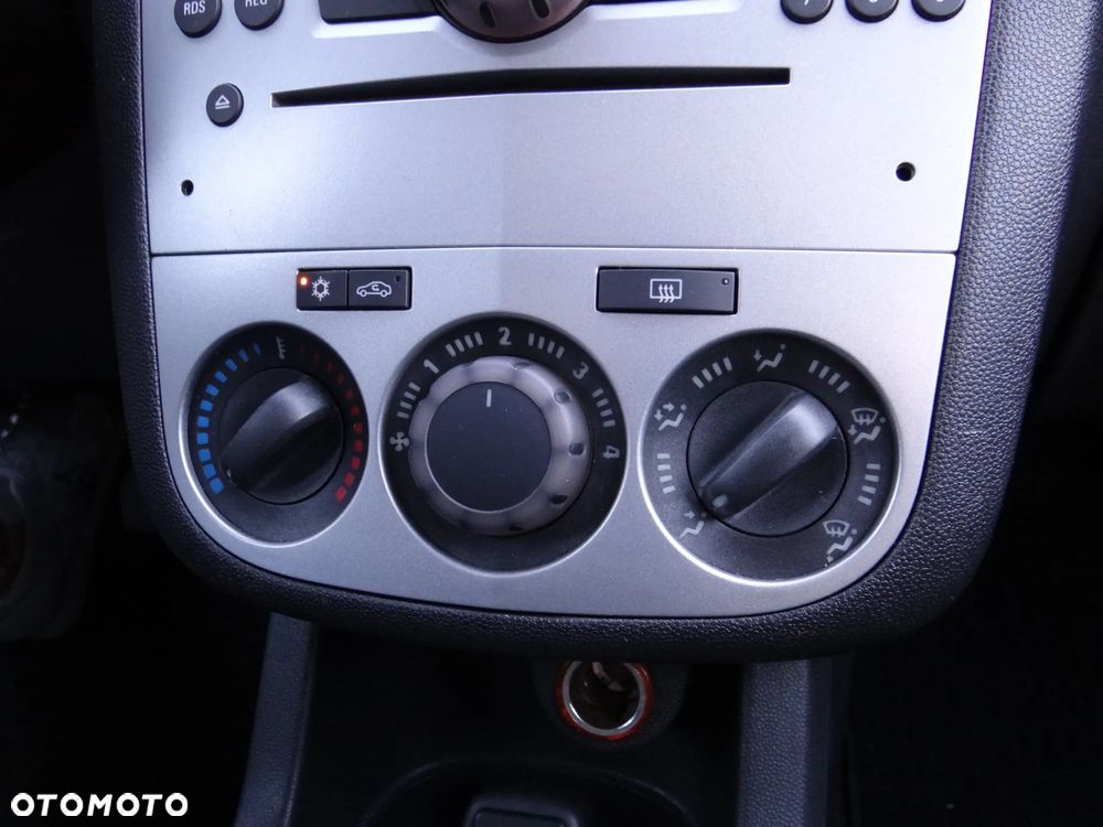 Opel Corsa 1.2 16V Enjoy - 32