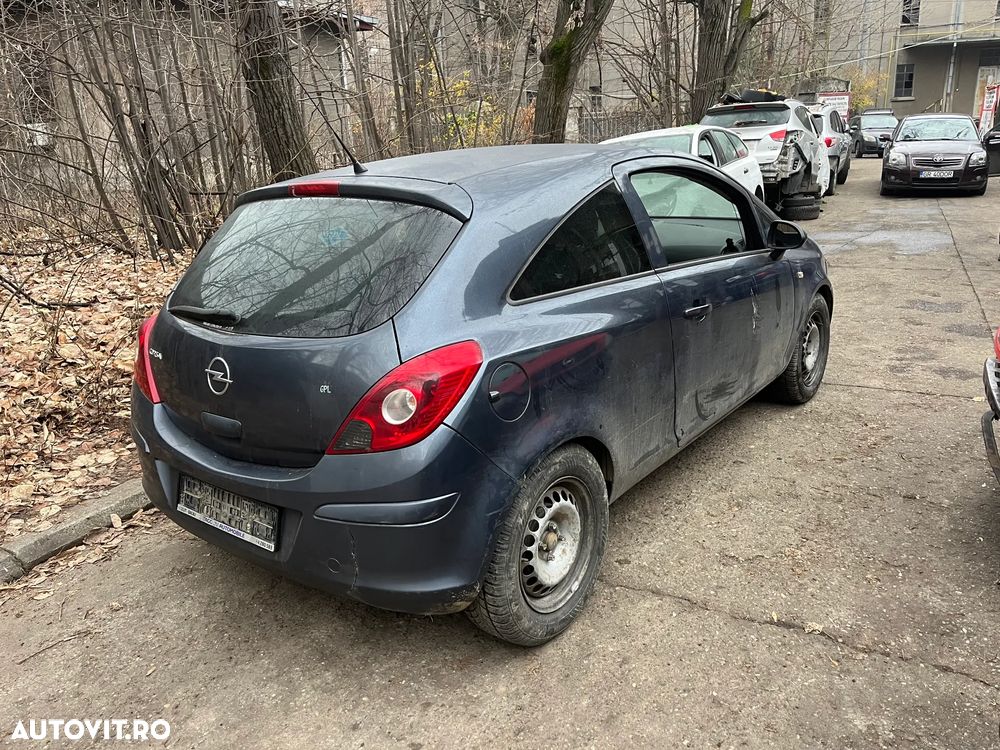Dezmembrez Opel Corsa D coupe 2006 benzina gri inchis - 2