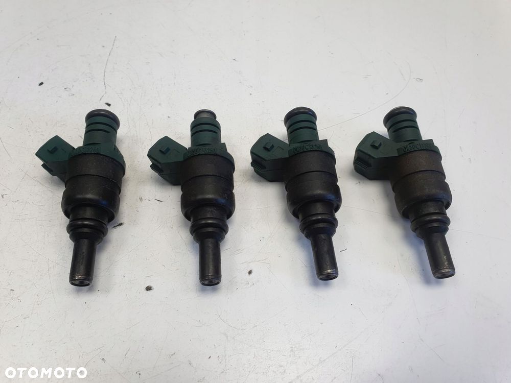 WTRYSKIWACZ Kia Rio I 1.3 8V _ wtrysk 0K30C13250 - 2