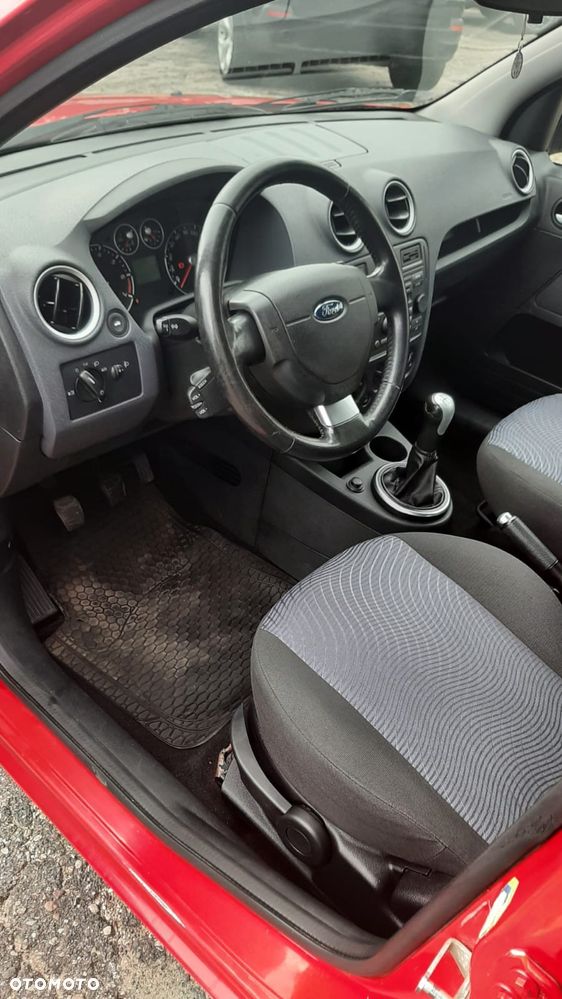 Ford Fusion 1.4 + - 12